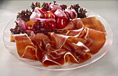 Parma ham with cherries marinated in ginger