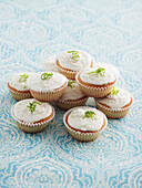 Cupcakes with white icing and lime