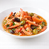 Pan-fried prawns, olives, and tomatoes