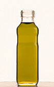 Bottle containing extra virgin olive oil