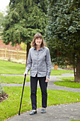 Woman using a walking stick