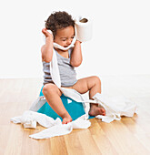 Toddler boy on potty