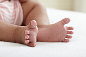 Bare feet and toes of baby girl