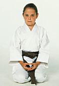 Girl in white karate suit
