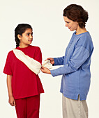 Tucking in loose fabric on child's elevation sling