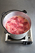 Rapid boiling of fruit to make jam on burner