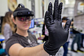 Technician using augmented reality goggles