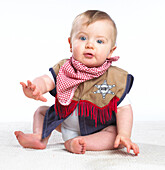Baby boy wearing sheriff's costume
