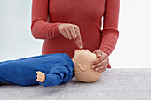 Treatment of unconscious infant