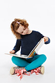 Girl sitting reading