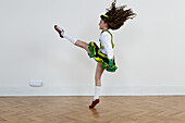 Girl performing high kick