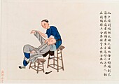 Chinese medicine practitioner massaging patient's shoulder