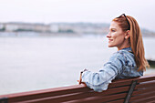 Woman sitting on a bench