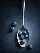 Blueberries on spoon