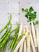 White and green asparagus spears and coriander
