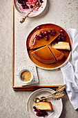 Creme brulee cake with cranberry compote and espresso