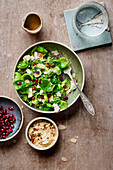 Brussels sprouts with feta, pomegranate seeds, and almond flakes