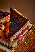 Triangle sandwiches with pressed caviar and ham