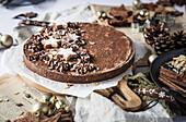 Hazelnut-maroni tart with chocolate cream and cinnamon stars