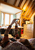 Woman using smartphone at home