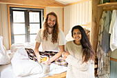 Happy young couple relaxing in cabin