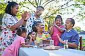 Happy multigenerational family celebrating birthday
