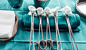 Surgical instruments and swabs on a table