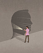 Woman shining torch into a head shaped tunnel, illustration