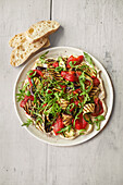 Layered houmous and griddled vegetable salad