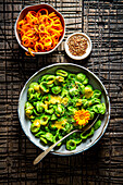 Orecchiette with pistachio pesto and carrot and buckwheat salad