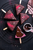 Vegan cheesecake sticks with poppy seed quark mixture and raspberry cream