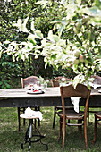 Set table in the summer garden