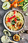 Vegan saffron risotto with celery and pepper salad