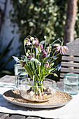 Bouquet of snake's head fritillaries, grape hyacinths and snowdrops