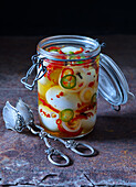 Pickled eggs with chillies, onions and cloves