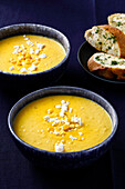 Cream of corn soup with feta and herb baguette