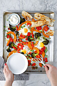 Colourful tray vegetables with fried eggs