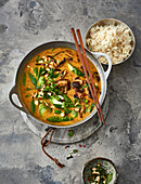 Vegan coconut curry with shiitake and green vegetables