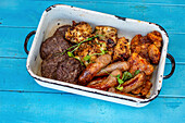 Grilled burgers, chicken, pork and sausages