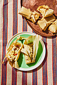 Green tamales with chicken filling