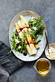 White asparagus with rocket salad and balsamic reduction