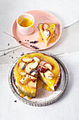 Ricotta cheesecake with brandy peaches, vanilla and lemon curd