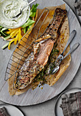 Grilled whole salmon