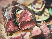 Grilled lamb fillet with herb-oil marinade