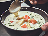Creamed asparagus soup with salmon