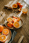 Freshly squeezed orange juice and oranges