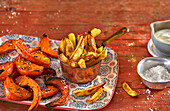Oven-baked pumpkin and chips with aioli
