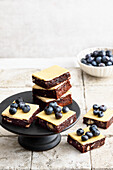 Brownies with cream cheese icing and blueberries