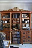 Ornaments in antique apothecary cabinet