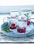 Flavoured Water with raspberries and rosemary